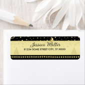 金ゴールドの光沢のあるクリスマススター、金ゴールドと黒の前足 ラベル (インサイチュ)