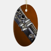 金ゴールドの背景のオーナメントが付いているクラリネット セラミックオーナメント (右)