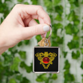 金ゴールドの赤いルビー玉付きケルトハート宝石 キーホルダー (手)