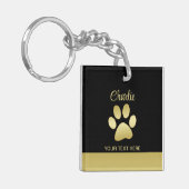 金ゴールドシャイニーな犬の手を黒い背景に キーホルダー (正面左)