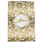 金ゴールドトーンのフローラが白い背景で減衰 ミディアムペーパーバッグ (正面)