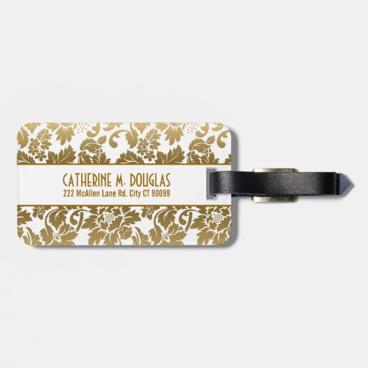 金ゴールドトーンのフローラが白い背景で減衰 ラゲッジタグ (裏面横)