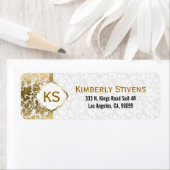 金ゴールドトーンのフローラが白い背景で減衰 ラベル (インサイチュ)