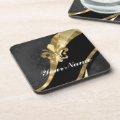 金ゴールドフルーアデリスオンブラック コースター (左側)