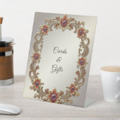 金ゴールドフローラフレームとレッドストーンズのテーブルトップシンボルや象徴 台座サイン (インサイチュ)