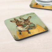 金ゴールド卵のヴィンテージイースタービクトリアン コースター (左側)