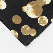 金ゴールド水玉模様の黒い背景。 フリースブランケット (角)