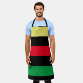 金ゴールド赤緑黒太い線パンアフリカ エプロン (着用した状態)