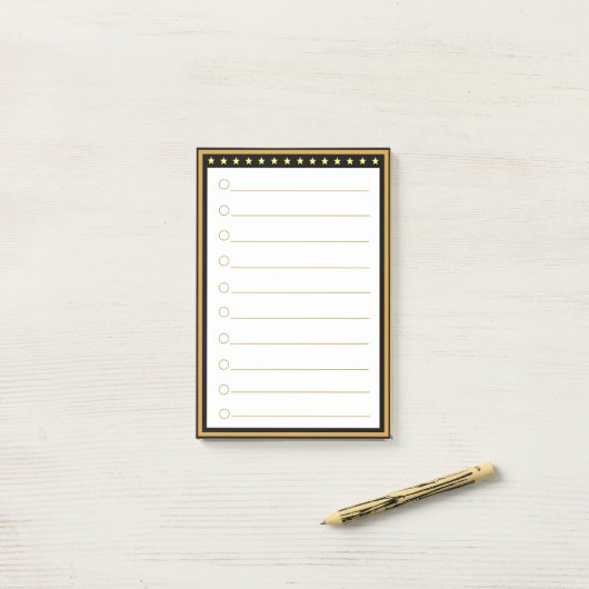 金ゴールド黒い枠の線が付いた後のメモ ポストイット (デスク上)