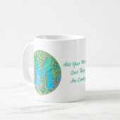 金ゴールド、ターコイズレターMおよび花カラフル付 コーヒーマグカップ (正面左)