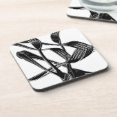 金属の コースター (左側)