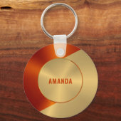 金属金ゴールドと赤色の幾何学的デザイン キーホルダー (正面)