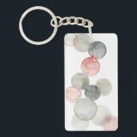 金球 キーホルダー<br><div class="desc">ギルド・スフィアI by Grace Popp.さまざまな面に水色のグレーとピンクの円が特徴。</div>