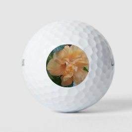 金色のボールにオレンジ色のハイビスカスの花 ゴルフボール