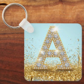金色のラメの背景に輝くダイヤモンドの文字A キーホルダー (正面)
