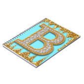 金色のラメ背景に輝くダイヤモンドの文字B ノートブック (左側)