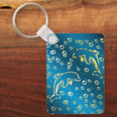 金色の水滴を持つ金のイルカ キーホルダー (正面)