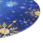 金色の雪の結晶とブルーのクリスマスの背景 カッティングボード (角)
