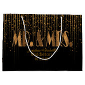 金銅の星のシャワーおよび黒 ラージペーパーバッグ (裏面)