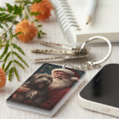 金髪のポインティンググリフォンサンタクロースのクリスマス キーホルダー (正面右)