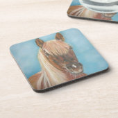 金髪のマネウマ科のート馬 コースター (左側)