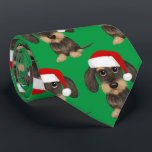 金髪ダシュントSanta Teckelクリスマス犬 ネクタイ<br><div class="desc">サンタハットを着た可愛らしい金髪のダックシュントのアロバープリントを特徴とするフェスティバルの緑のネックタイで、あなたのワードローブにいくつかの休日の応援を追加。あなたはオフィスに向かうかどうかクリスマスのパーティーやフォーマルより多くの休日のイベントユニーク、この目を引くネックタイは確実に気づかせている。テッケル愛好家のための完璧な贈り物！</div>