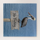 釣り禁止の看板の上のペリカンと魚 ジグソーパズル (横)