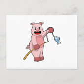 釣り竿と魚を持って釣りをしている豚 ポストカード (正面)