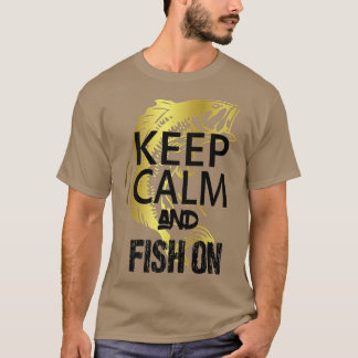 釣り落ち着いた魚をティーにおもしろい置く Tシャツ