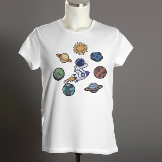 銀河系夢を見る探検家の宇宙飛行士と惑星 Tシャツ