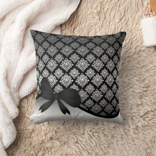 銀製のサテンのダマスク織の黒の渦巻のリボンの弓 クッション (ブランケット)