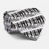 銀製の黒いピアノキーボードのノートおよび星 ネクタイ (ロール)