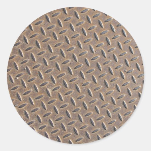 鋼や市松模様に金属で作られた錆びたプレート ラウンドシール (正面)