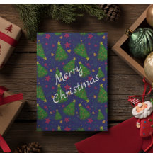 鐘と赤い花を持つ青いクリスマスツリー