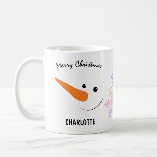 長い鼻と笑顔の雪だるま、陽気なクリスマス コーヒーマグカップ (左)
