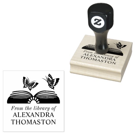開いた本に二匹の蝶 図書館の本の名前 ラバースタンプ (押印)