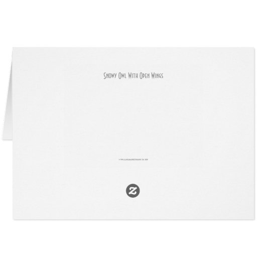 開いた翼が弧を描いた雪フクロウ (裏面横)