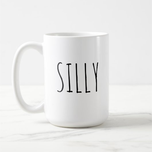 間抜けなノベルティのコーヒー・マグ コーヒーマグカップ (左)