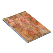 除去されたモダン背景のオレンジ色のフローラプリント ノートブック (右側)