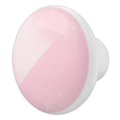 陶磁器のノブのあたりで影で覆われる淡いピンク セラミックノブ (右)