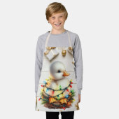 陽気なクリスマスの小さなアヒルが光に絡まっていた エプロン (着用した状態)