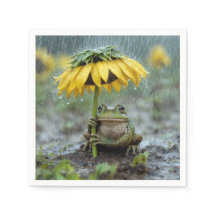 雨の中ひまわりの傘の下のカエル