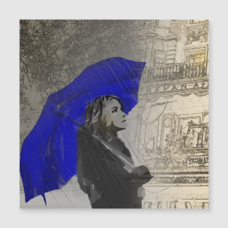 雨の中傘をさす女性