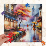 雨カラフルの日に市水カラーパズル ジグソーパズル<br><div class="desc">パズルは水の色絵画の女の子の傘の歩くの過去の花の店の町の雨の日に。</div>