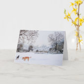 雪が多い景色の景色のクリスマスで遊んでいる犬 カード (黄色い花)