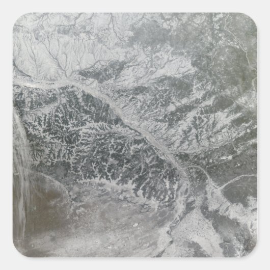 雪が降り積もったぼんやりしたロシア中部のオブ・リを示す スクエアシール (正面)