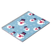 雪だるまおよび雪片が付いている青いクリスマスパターン ノートブック (左側)