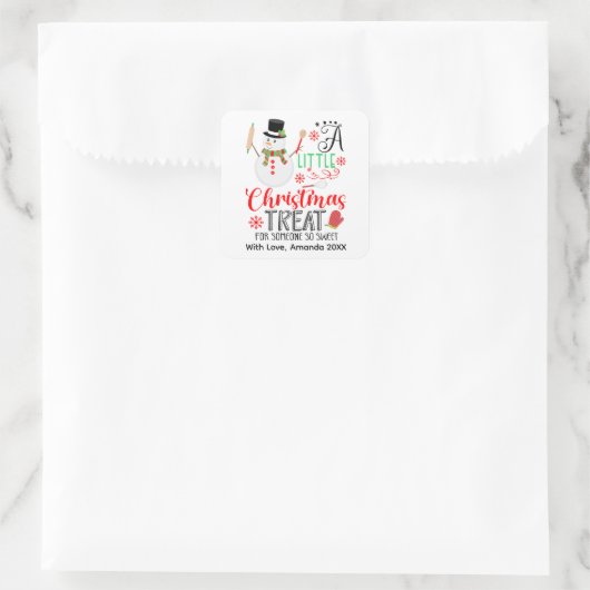 雪だるまがちょっとしたクリスマスのお菓子を作る スクエアシール (バッグ)