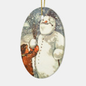 雪だるまのクリスマスツリーのオーナメントを持つエストニア語の男の子 セラミックオーナメント (左)