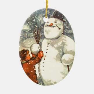 雪だるまのクリスマスツリーのオーナメントを持つエストニア語の男の子 セラミックオーナメント